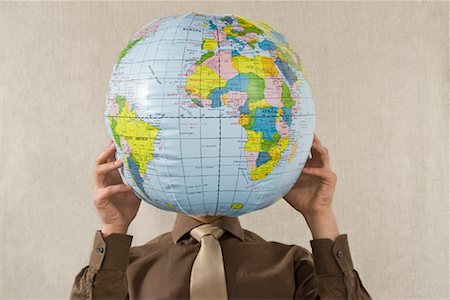 Businessman Holding Globe Stock Photo - Rights-Managed, Code: 700-02080518