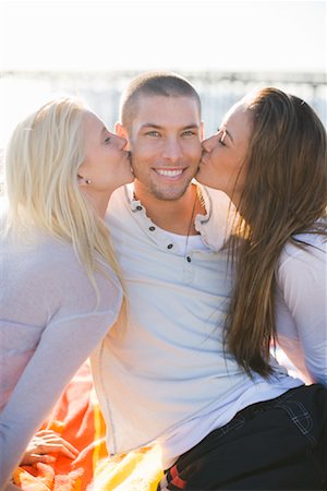 party summer usa not business not winter not autumn not indoors not office not family - Women Kissing Man on Cheeks, Newport Beach, California, USA Stock Photo - Rights-Managed, Code: 700-02080881