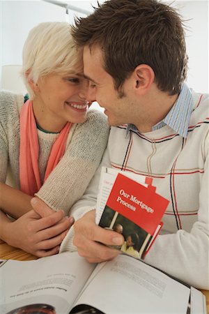 Couple Holding Financial Brochures Stock Photo - Rights-Managed, Code: 700-02081839