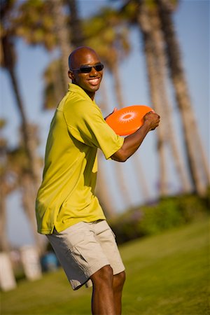 people flying disc - Man Playing Frisbee, Huntington Beach, Orange County, California, USA Stock Photo - Rights-Managed, Code: 700-02081955