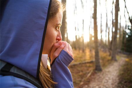 exhale mature - Woman Tring to Stay Warm while Hiking in the Sangre de Cristo Mountains, New Mexico, USA Stock Photo - Rights-Managed, Code: 700-02081994