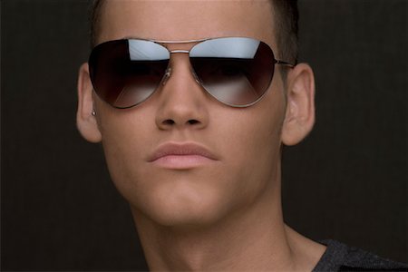 sunglasses wearing men - Close-up Portrait of Man Wearing Sunglasses Stock Photo - Rights-Managed, Code: 700-02082070