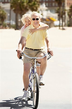 senior couple riding bicycles - Couple Riding Bicycle, Santa Monica Pier, Santa Monica, California, USA Stock Photo - Rights-Managed, Code: 700-02125353