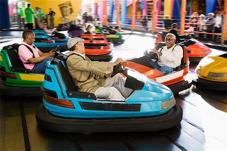 friends afro american - Seniors Riding Bumper Cars, Santa Monica Pier Amusement Park, California, USA Stock Photo - Rights-Managed, Code: 700-02125383