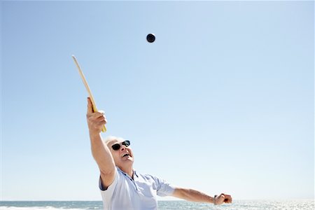 Man Playing Paddle Ball on Beach, Santa Monica Pier, Santa Monica, California, USA Stock Photo - Rights-Managed, Code: 700-02125703