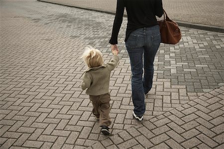 rear view of two children holding hands - Toddler Holding Mother's Hand Stock Photo - Rights-Managed, Code: 700-02129120