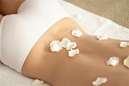 relax recharge unwind - Flower Petals on Woman's Back Stock Photo - Rights-Managed, Code: 700-02121351