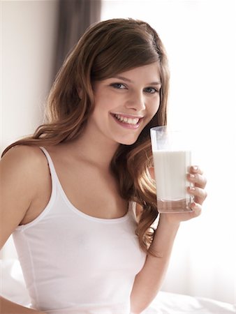 proteina - Woman with Milk Moustache Holding Glass of Milk Fotografie stock - Rights-Managed, Codice: 700-02121423