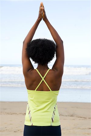exercise black people water - Woman Doing Yoga on Beach, Newport Beach, California, USA Foto de stock - Con derechos protegidos, Código: 700-02121694