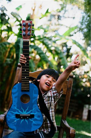 Boy with Guitar Outdoors Stock Photo - Rights-Managed, Code: 700-02130199