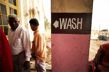 Two Men Next to Wash Sign, Trivandrum, Kerala, India Stock Photo - Rights-Managed, Code: 700-02156708