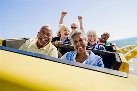 enthusiastic senior couple on amusement park - People on Roller Coaster, Santa Monica, California, USA Stock Photo - Rights-Managed, Code: 700-02156931