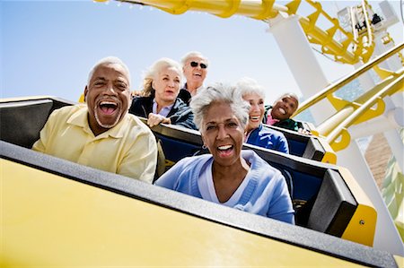 enthusiastic senior couple on amusement park - People on Roller Coaster, Santa Monica, California, USA Stock Photo - Rights-Managed, Code: 700-02156932