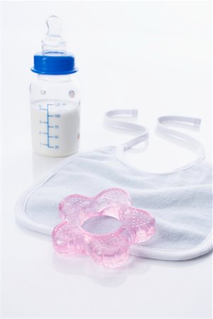 Baby Bottle, Bib and Teething Ring Stock Photo - Rights-Managed, Code: 700-02159098
