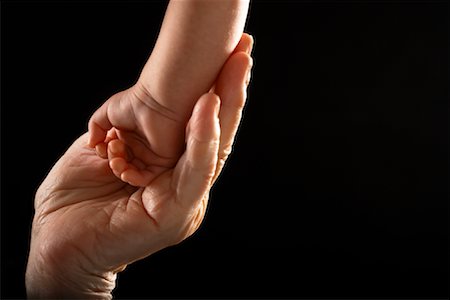 Woman Holding Baby's Hand Stock Photo - Rights-Managed, Code: 700-02199981