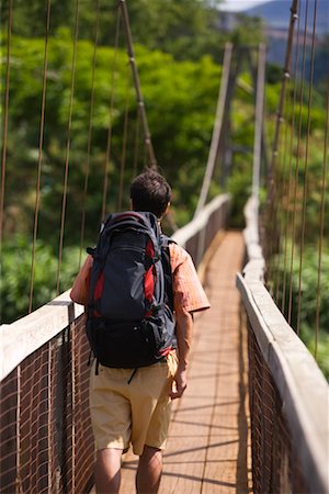 Hiker Crossing Suspension Bridge Stock Photo - Rights-Managed, Code: 700-02200134