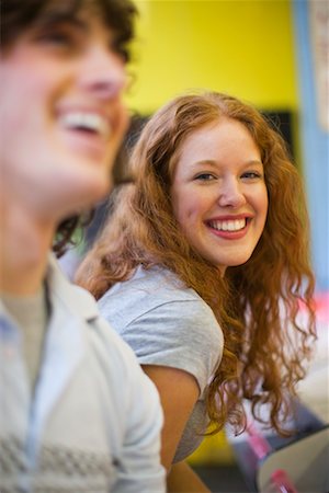 Teenage Girl and Boy Playing Games at an Amusement Park Stock Photo - Rights-Managed, Code: 700-02200325