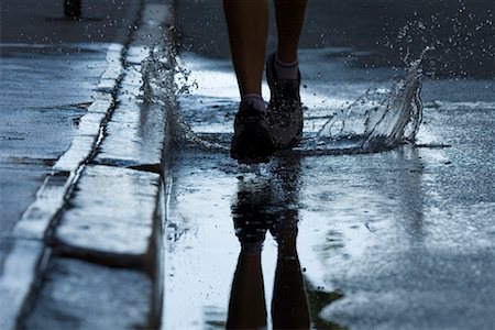 Man Running on Wet Road, Providence, Rhode Island, USA Stock Photo - Rights-Managed, Code: 700-02200350