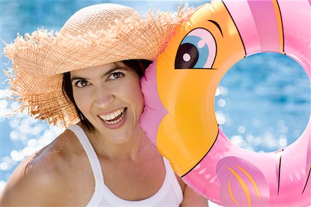 pool woman inflatable tube - Woman with Inflatable Ring Foto de stock - Con derechos protegidos, Código: 700-02200846