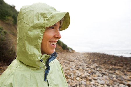 raincoat hood - Portrait of Woman on Rocky Shore, Palos Verdes, California Stock Photo - Rights-Managed, Code: 700-02200937
