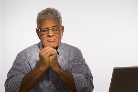 Old man confuse of technology Stock Photos - Page 1 : Masterfile