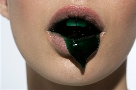 sticky - Close-up of Woman With Green Liquid Oozing From Mouth Stock Photo - Rights-Managed, Code: 700-02217298