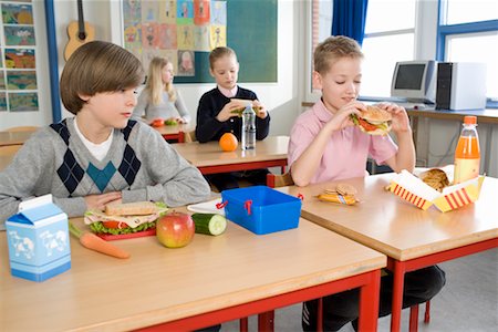 packaged prepared food - Boy with Healthy Lunch Looking at Boy with Fast Food Lunch Stock Photo - Rights-Managed, Code: 700-02217422