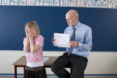 embarrassed kid - Unsuccessful Geography Student with Teacher Stock Photo - Rights-Managed, Code: 700-02217446