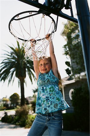 red (deportiva) - Girl Hanging from Basketball Net, Costa Mesa, California, USA Foto de stock - Con derechos protegidos, Código: 700-02217546