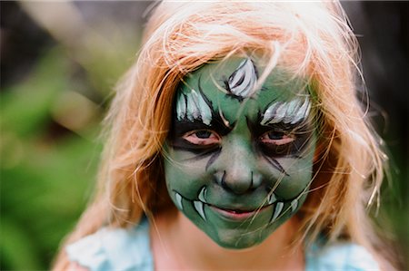 Girl with Painted Face, Costa Mesa, California, USA Foto de stock - Con derechos protegidos, Código: 700-02217549