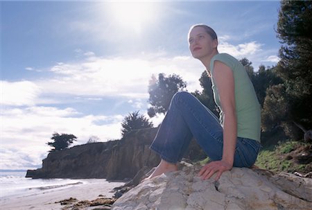 simsearch:400-05138433,k - Woman on Boulder on Beach, Leadbetter Beach, Santa Barbara, California, USA Stock Photo - Rights-Managed, Code: 700-02235746