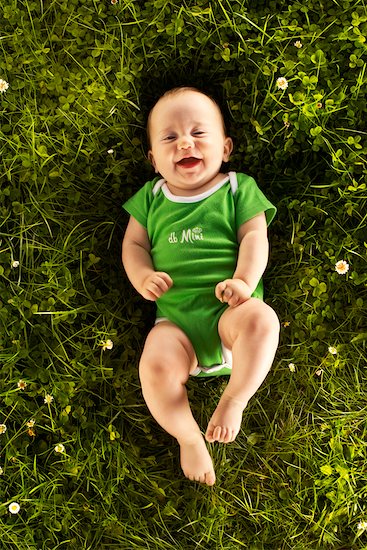 Portrait of Baby Lying on Grass Stock Photo - Premium Rights-Managed, Artist: Christian Deutscher, Image code: 700-02231854