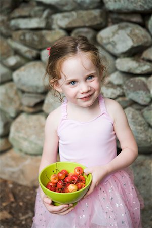 Portrait of Girl with Bowl of Cherries Stock Photo - Rights-Managed, Code: 700-02231858