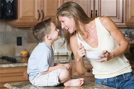 family eating at kitchen island - Mother and Son in Kitchen Stock Photo - Rights-Managed, Code: 700-02231922