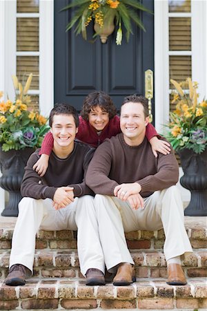 father and son portraits on steps - Portrait of Family Sitting on Porch Stock Photo - Rights-Managed, Code: 700-02231931