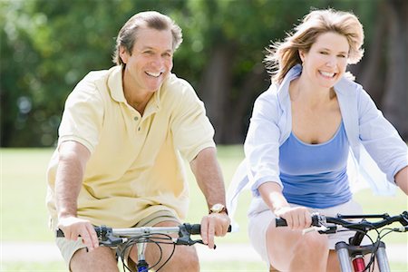 face of 40 year old man - Couple Riding Bikes Stock Photo - Rights-Managed, Code: 700-02231963