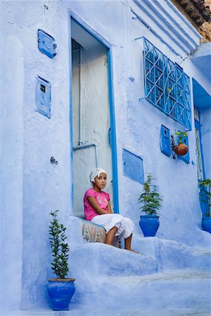 Child in Doorway, Chefchaouen, Morocco Stock Photo - Rights-Managed, Code: 700-02245111