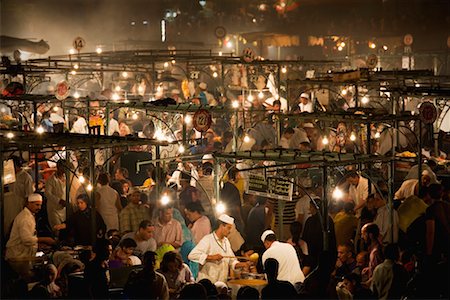 simsearch:700-02245132,k - Vue d'ensemble de la place Jemaa al Fna marché, Marrakech, Maroc Photographie de stock - Rights-Managed, Code: 700-02245149