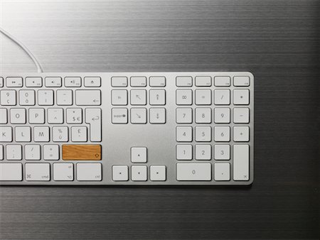 Clavier avec une seule clé en bois Photographie de stock - Rights-Managed, Code: 700-02245319