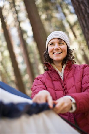 Woman Setting up Tent, Yosemite National Park, California, USA Foto de stock - Con derechos protegidos, Código: 700-02245511