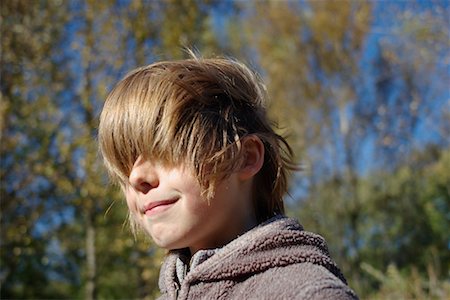 français (homme) - Portrait of Boy With Hair in Face, France Foto de stock - Con derechos protegidos, Código: 700-02245702