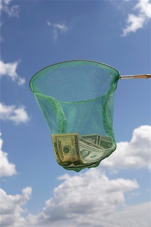 space and money - Fishing Net Holding Cash Stock Photo - Rights-Managed, Code: 700-02245815