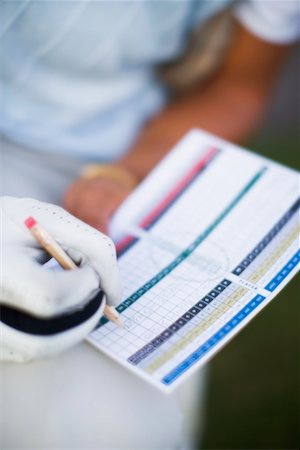 Golfer Filling Out Score Card, Salem, Oregon, USA Foto de stock - Direito Controlado, Número: 700-02257782