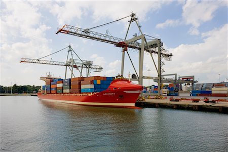 rotterdam - Gantries and Cargo Ship at Loading Dock, Rotterdam, Netherlands Stock Photo - Rights-Managed, Code: 700-02257907