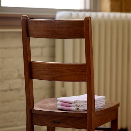 stack chairs - Tea Towels on Wooden Chair Stock Photo - Rights-Managed, Code: 700-02264123