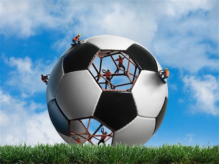 Gebäude-Arbeitnehmer-Gebäude einen Fußball Stockbilder - Lizenzpflichtiges, Bildnummer: 700-02264973