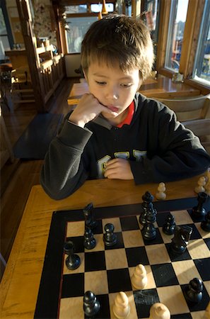 Boy Playing Chess, Portland, Oregon, USA Stock Photo - Rights-Managed, Code: 700-02265161