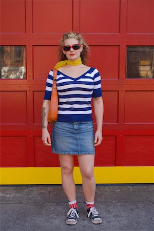 denim skirt - Portrait of Woman Against Garage Door Stock Photo - Rights-Managed, Code: 700-02265266