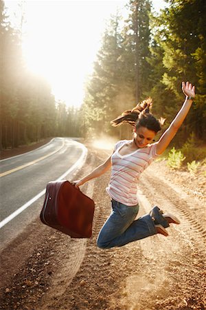 Girl Dancing on Side of Road, Pacific Coast Highway, California, USA Stock Photo - Rights-Managed, Code: 700-02265397