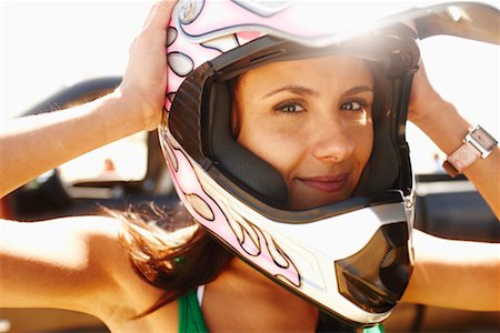 sans cession de droits - Femme portant un casque de course Photographie de stock - Rights-Managed, Code: 700-02265428